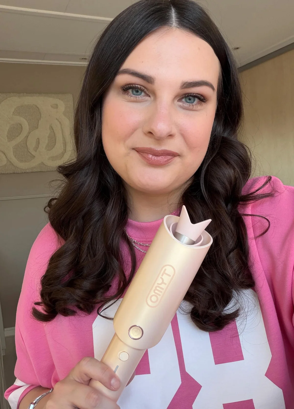 TYMO CurlPro automatic curling iron on vanity