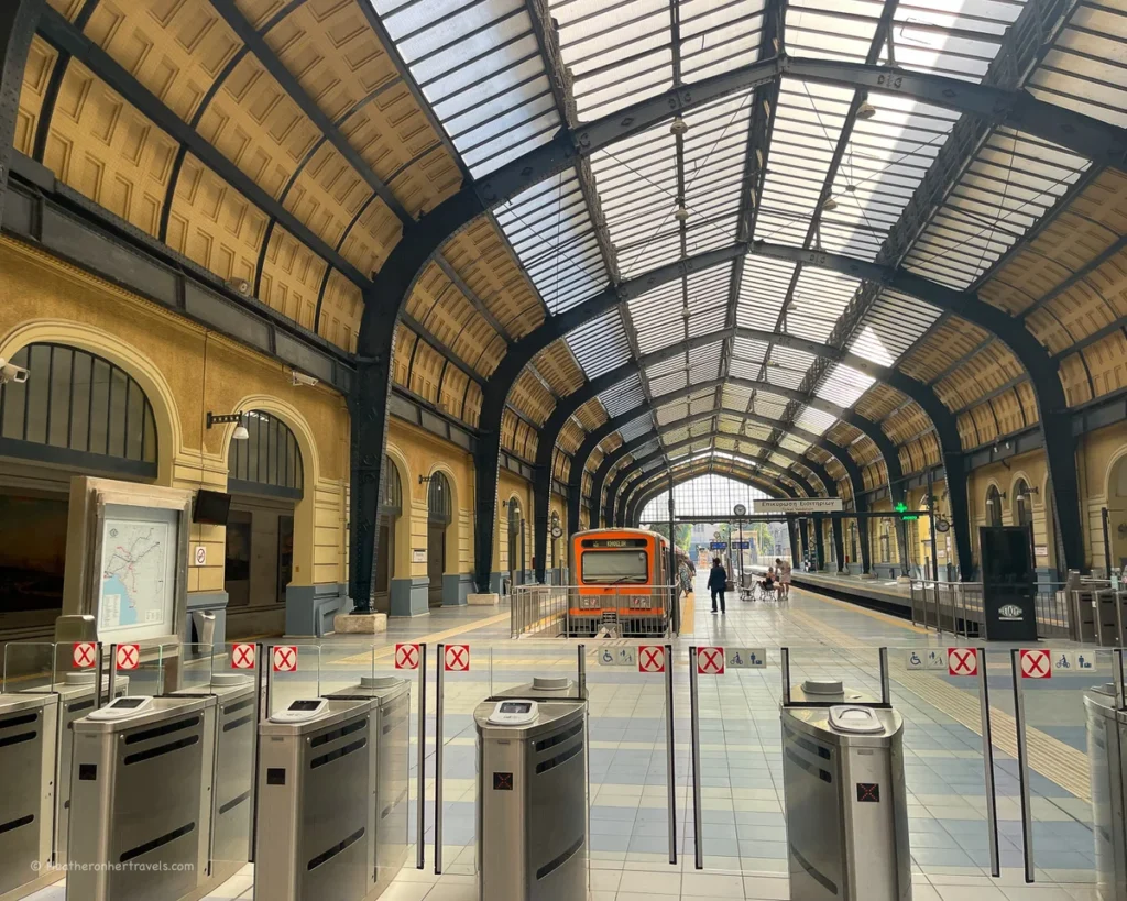 Glass-roofed train station hall in Piraeus Greece
