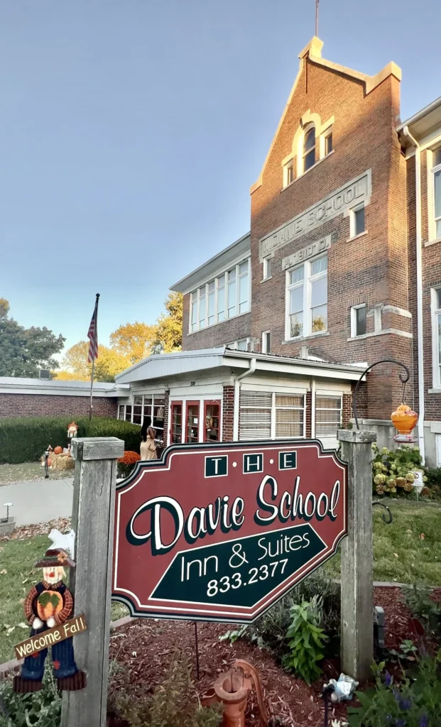 Historic red-brick Davie School Inn exterior in autumn