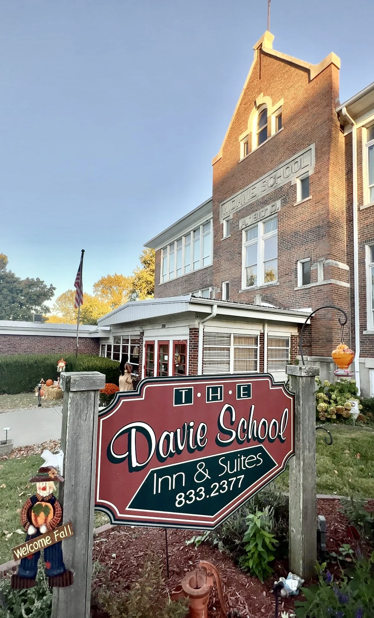 Historic red-brick Davie School Inn exterior in autumn