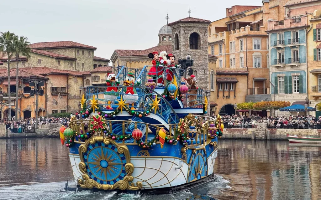 Christmas parade float gliding through Mediterranean Harbor at Tokyo DisneySea