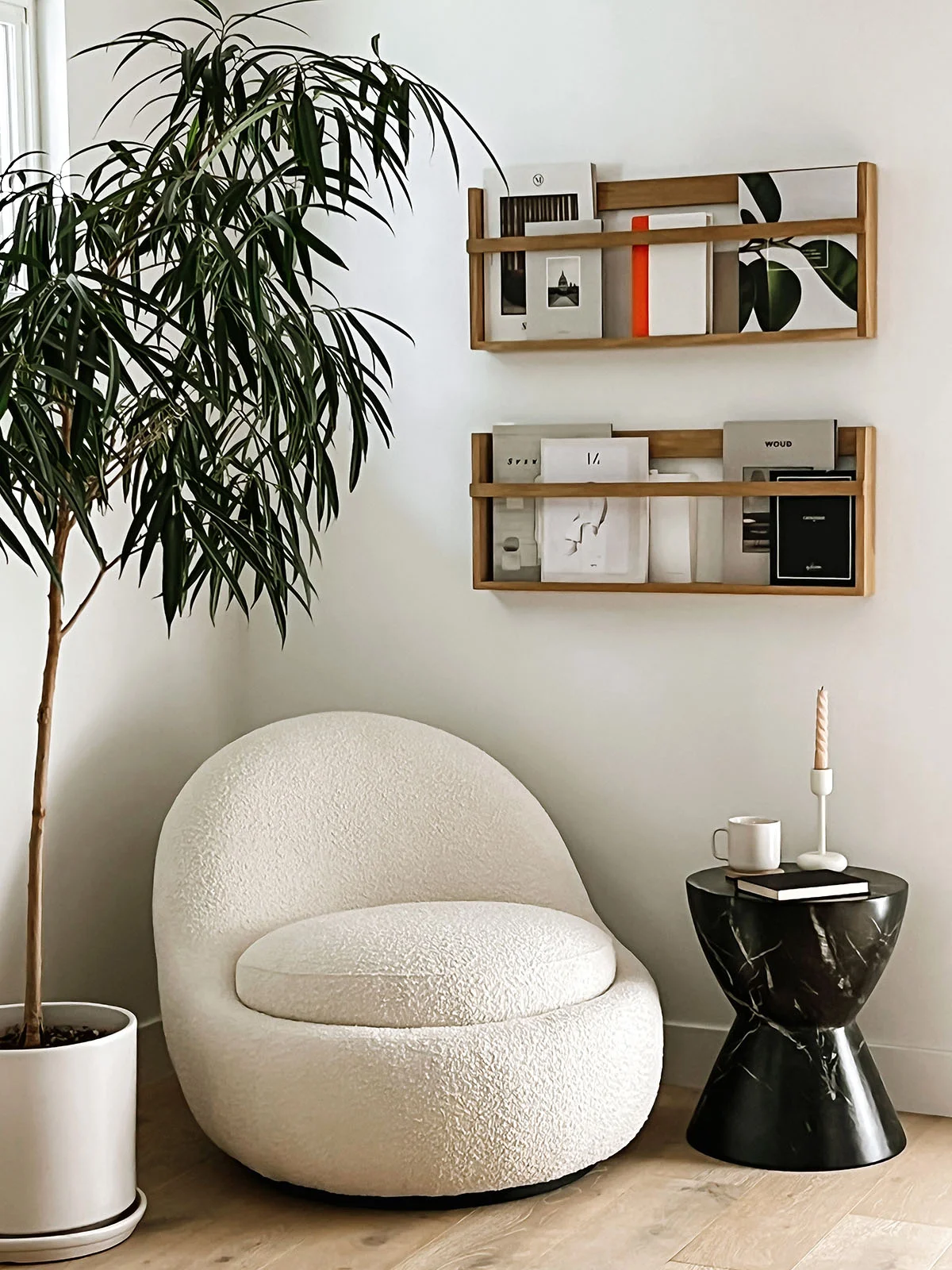 Boucle lounge chair in cozy home reading corner