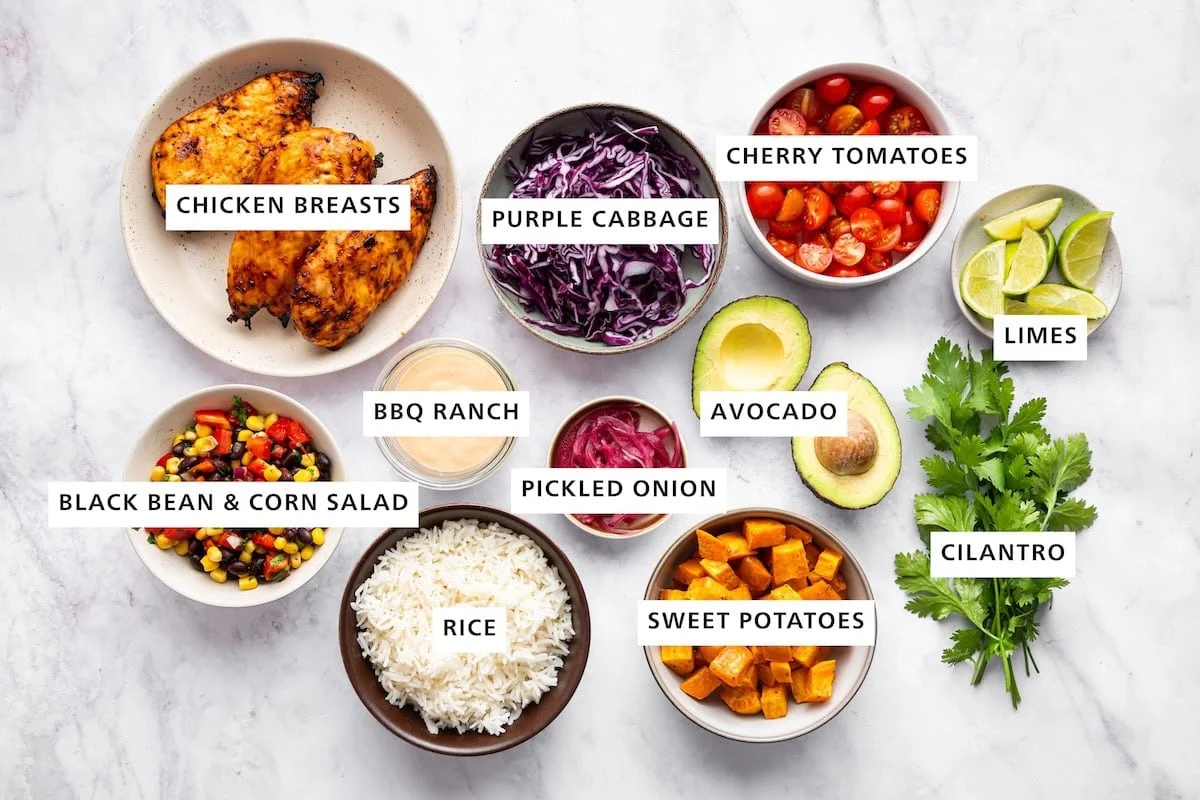 Ingredients for BBQ chicken bowls laid out on kitchen counter