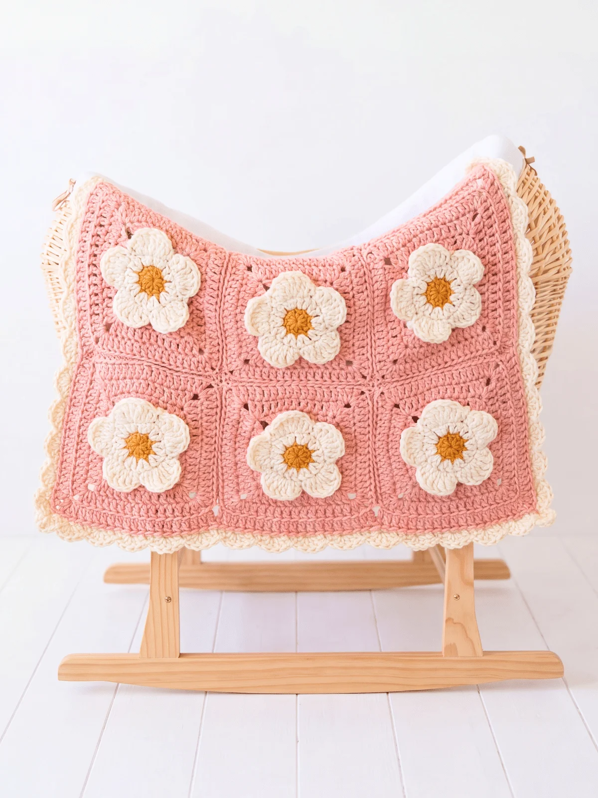 Close-up of raised 3D crochet petals on a chunky square