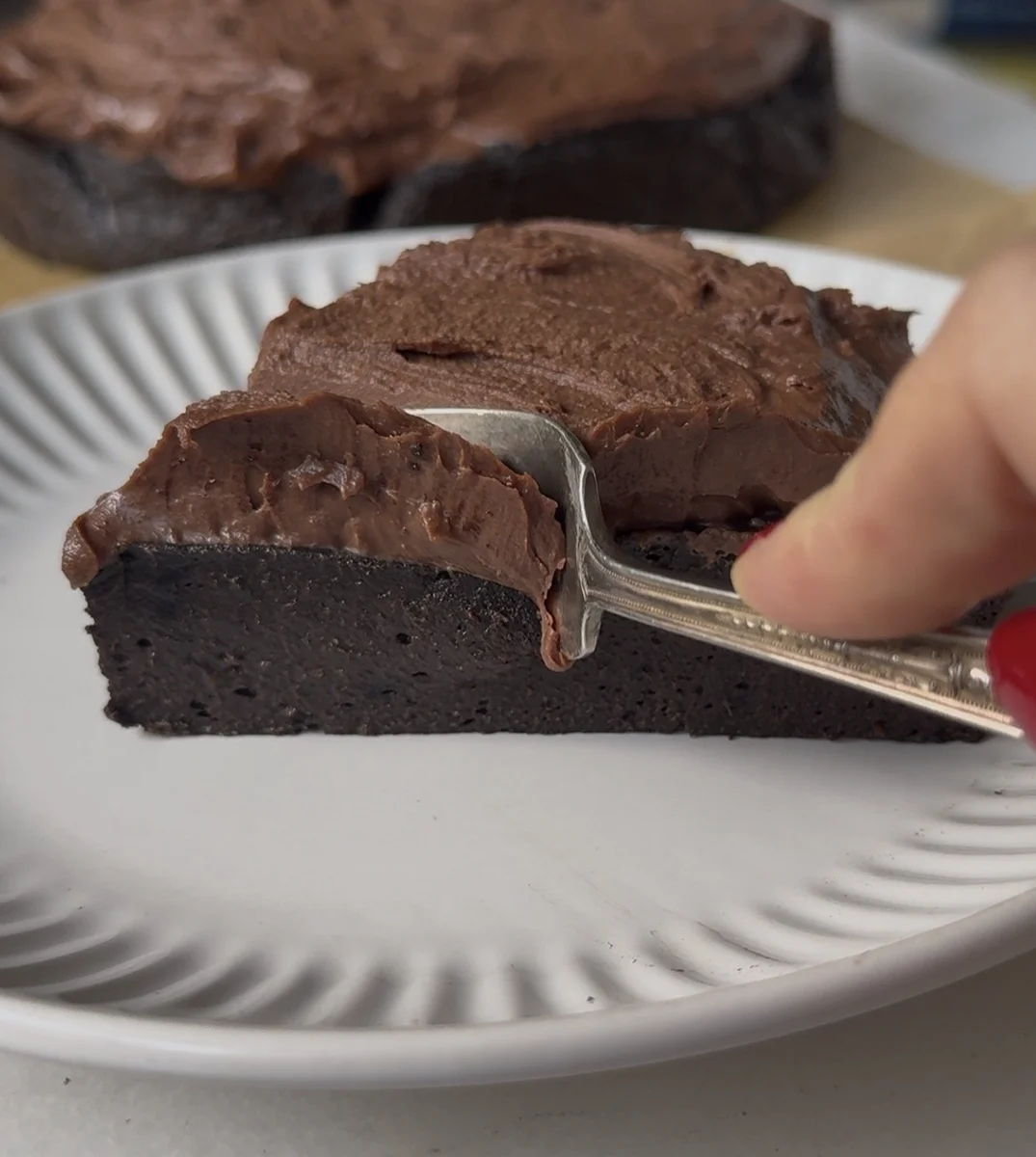 Chocolate cake ingredients laid out on kitchen counter