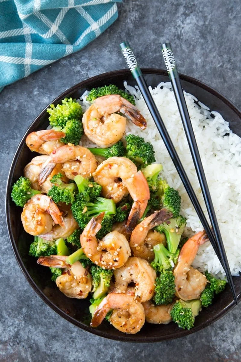 Shrimp and broccoli tossed together in honey garlic sauce