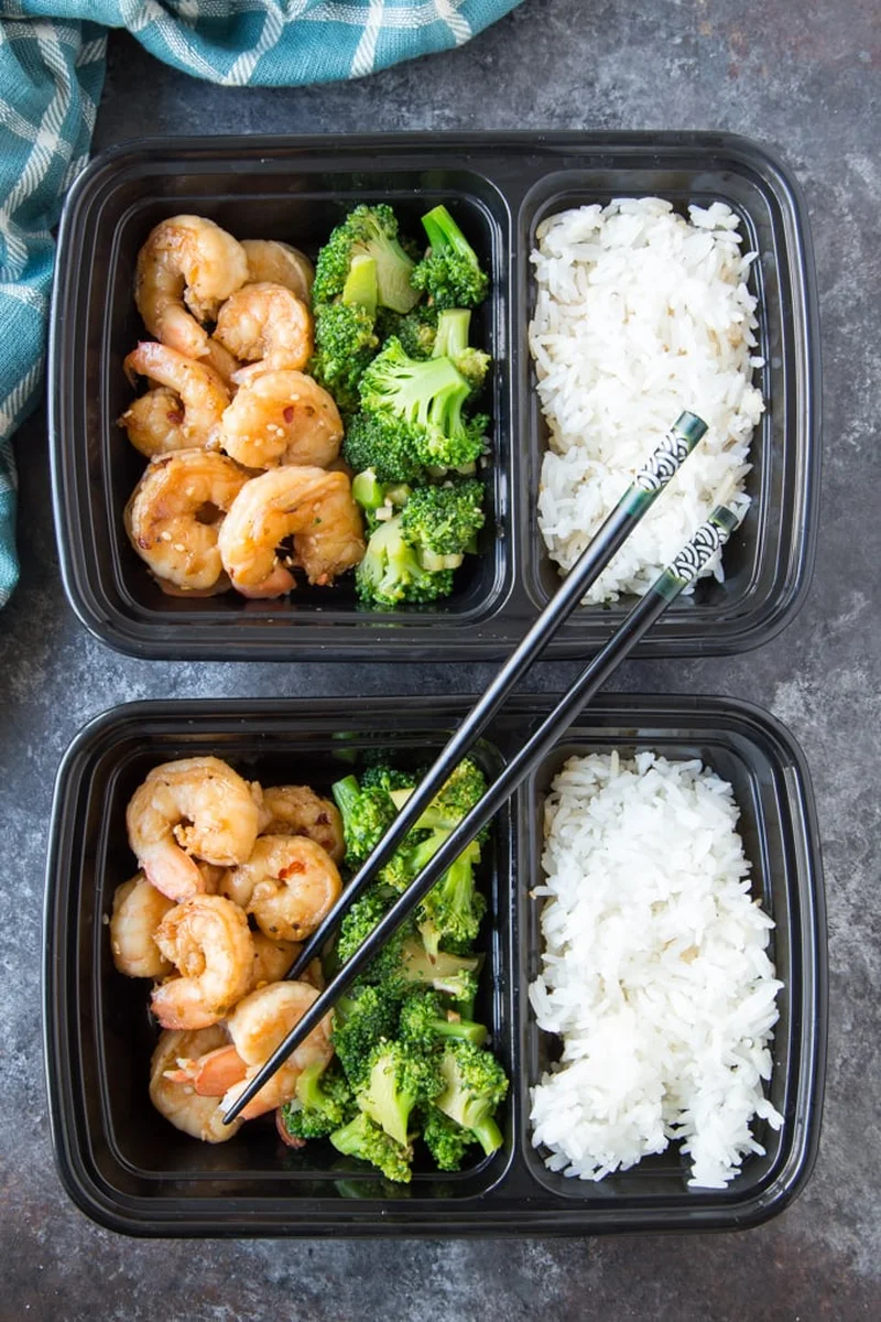 Close-up of glazed honey garlic shrimp and green onions
