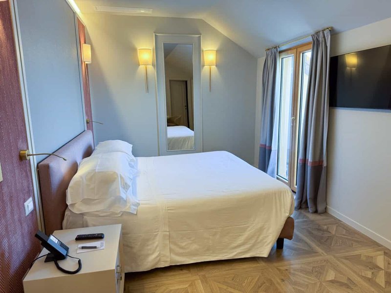 Standard double room interior at Hotel Cenobio dei Dogi