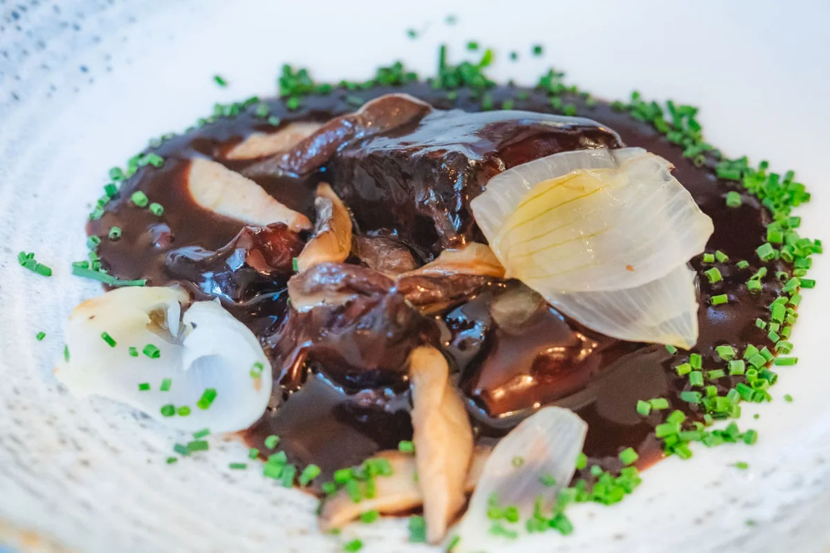 Coq au vin chicken stew served in Lyon