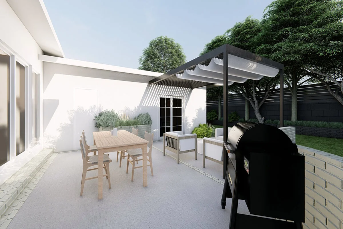 Phased backyard renovation with trees and hardscaping