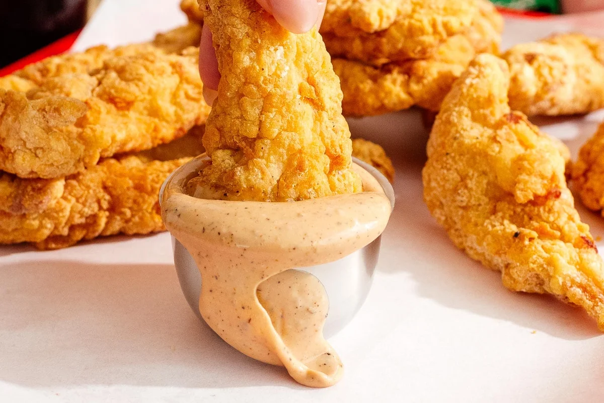 Chicken fingers with Cane's sauce for dipping