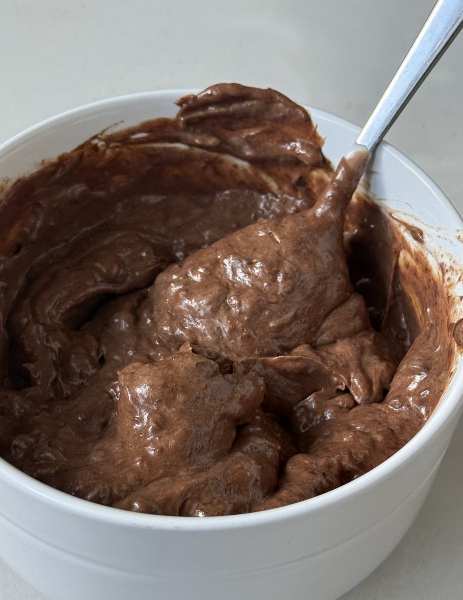 Sliced healthy chocolate cake ready for serving on plate