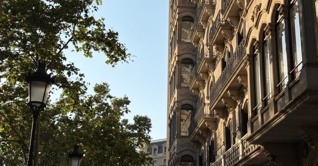 Quiet Barcelona street in soft golden evening light