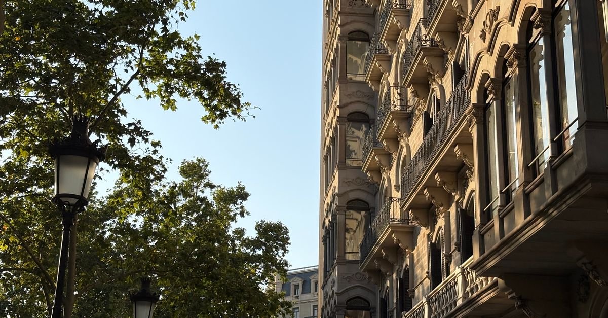 Quiet Barcelona street in soft golden evening light