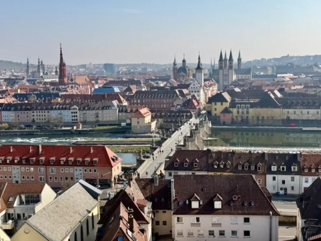 Würzburg old town at dusk with river and spires