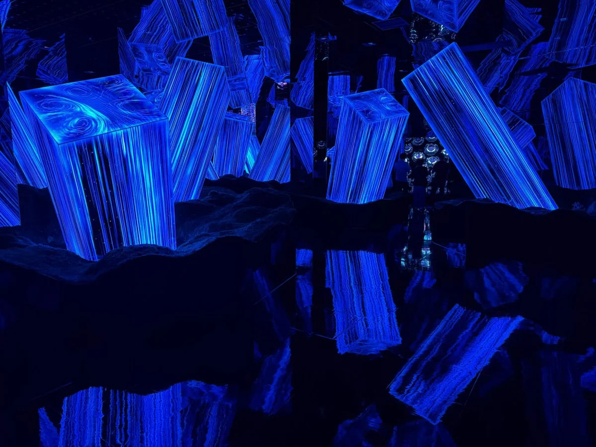 Covered walkway leading to the quiet teamLab Biovortex building near Kyoto Station