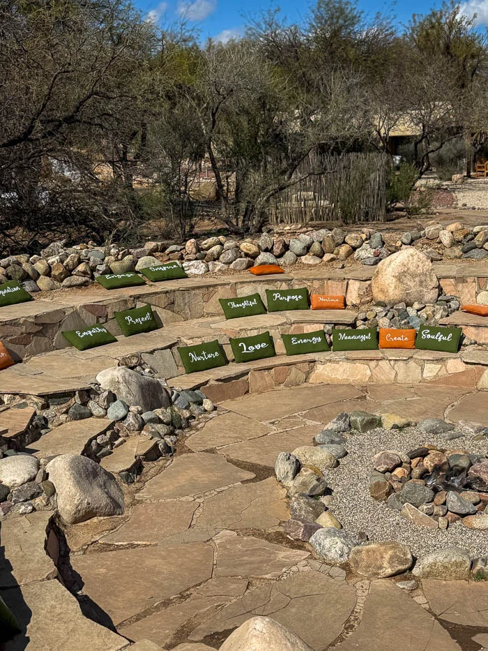 Outdoor meditation garden with cushioned stone seating